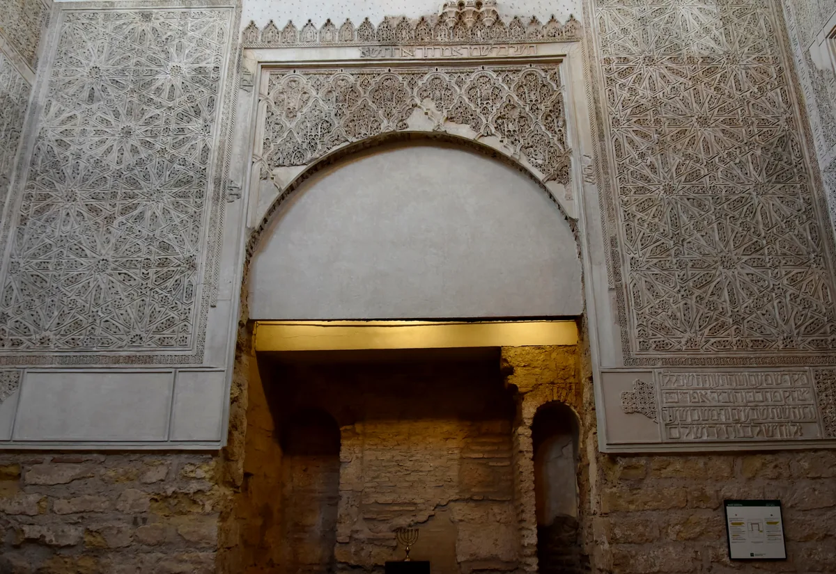Carved stucco and horseshoe arch of the fourteenth-century synagogue of Cordoba